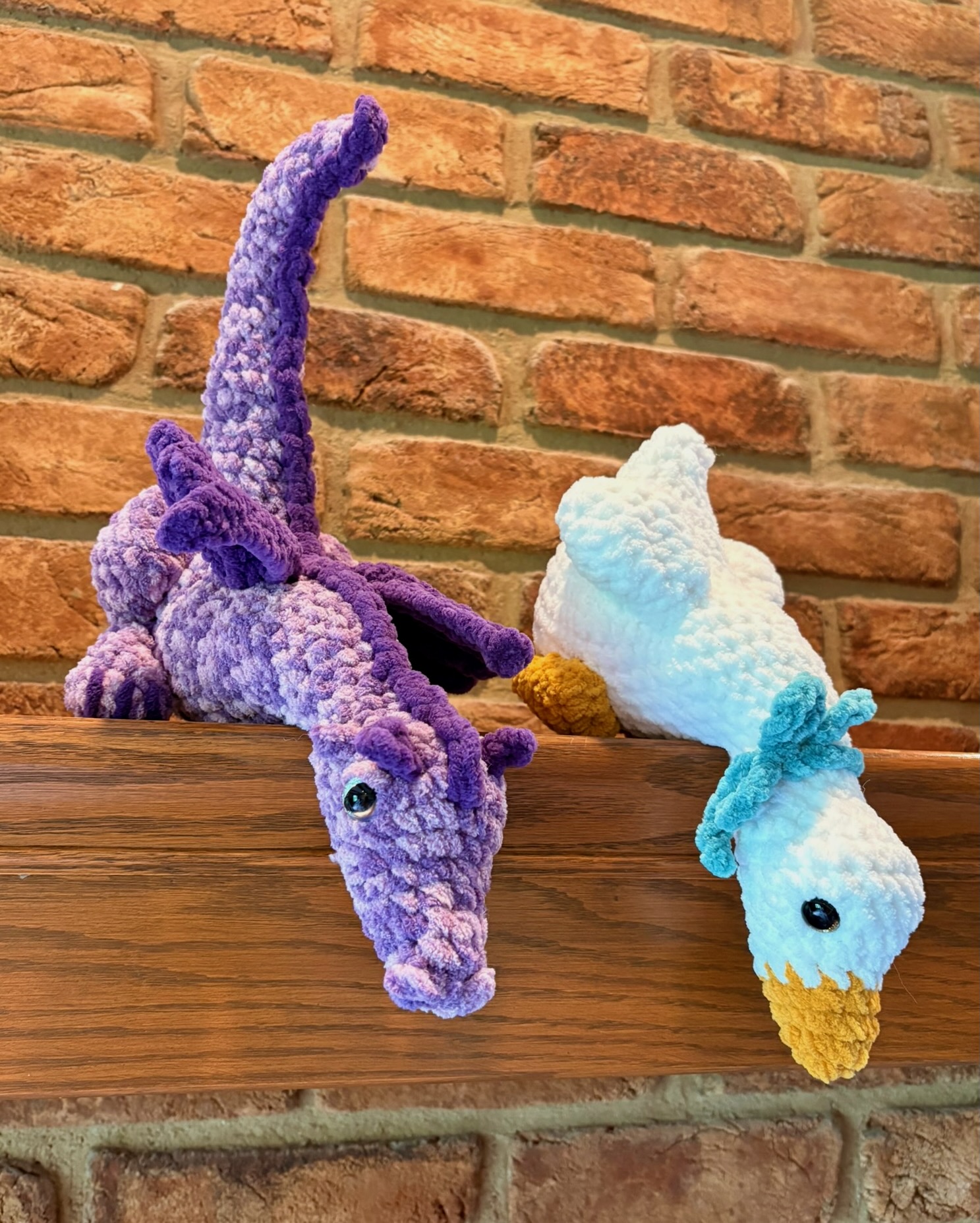 Crochet dragon and goose plushies